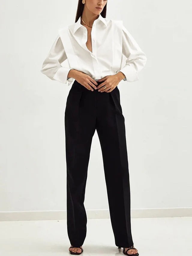 Camicia con colletto a punta e maniche a sbuffo