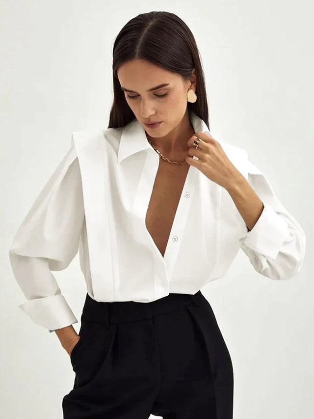 Camicia con colletto a punta e maniche a sbuffo