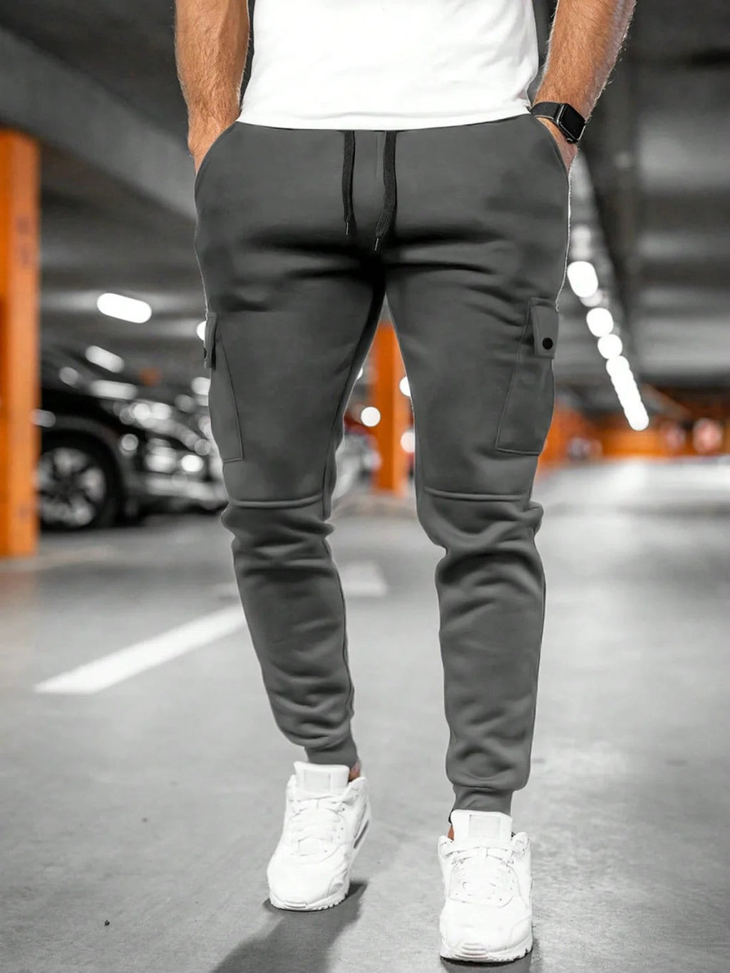Pantaloni aderenti con tasconi a pattina – Grigio scuro