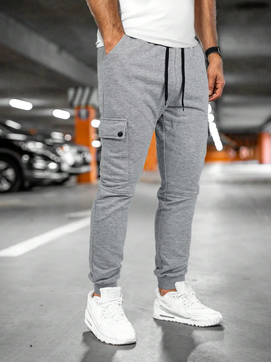 Pantaloni aderenti con tasconi a pattina – Grigio chiaro