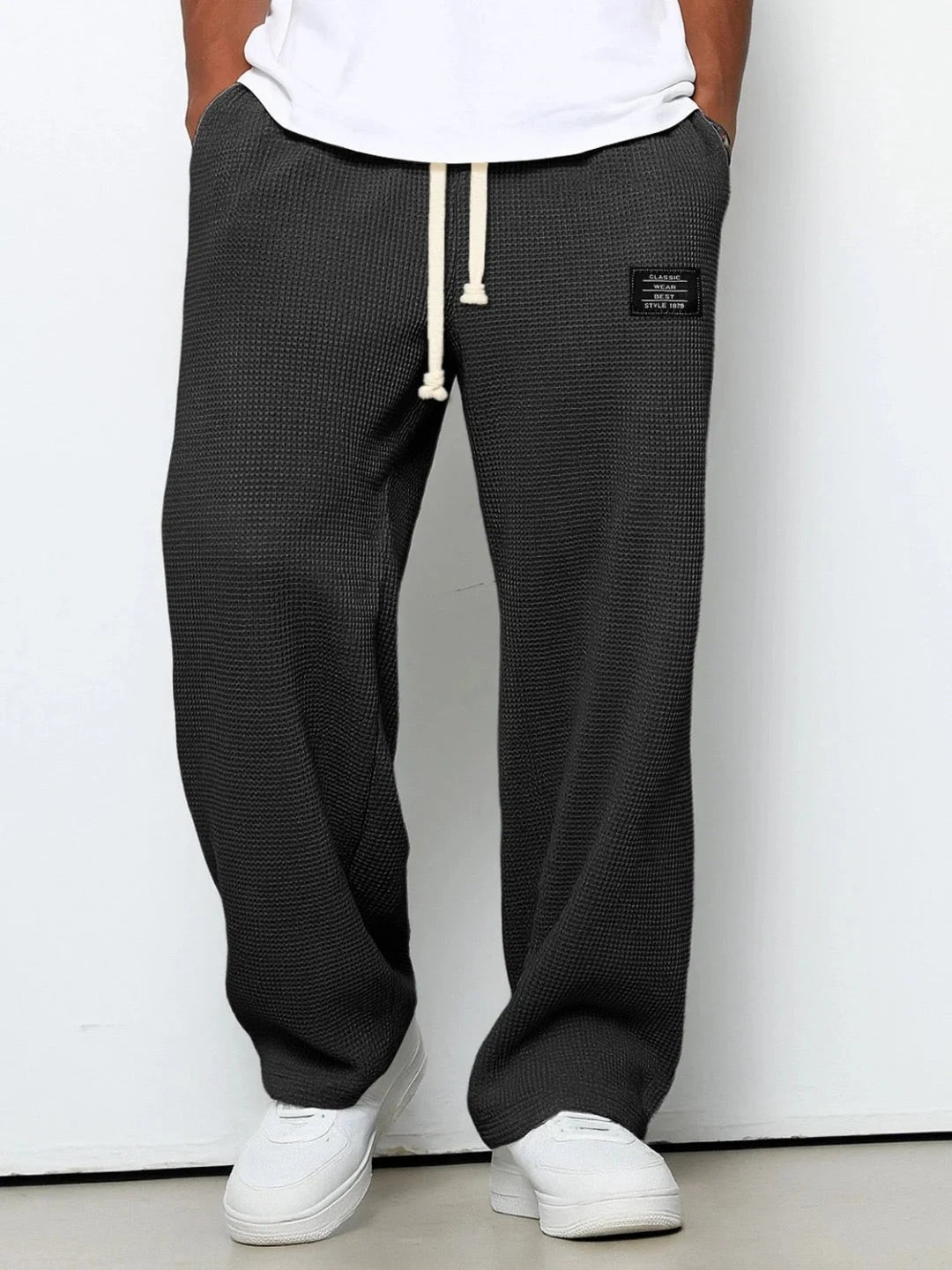 Pantaloni larghi testurizzati con cordoncino – Nero
